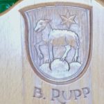 Heraldic emblem on chairback